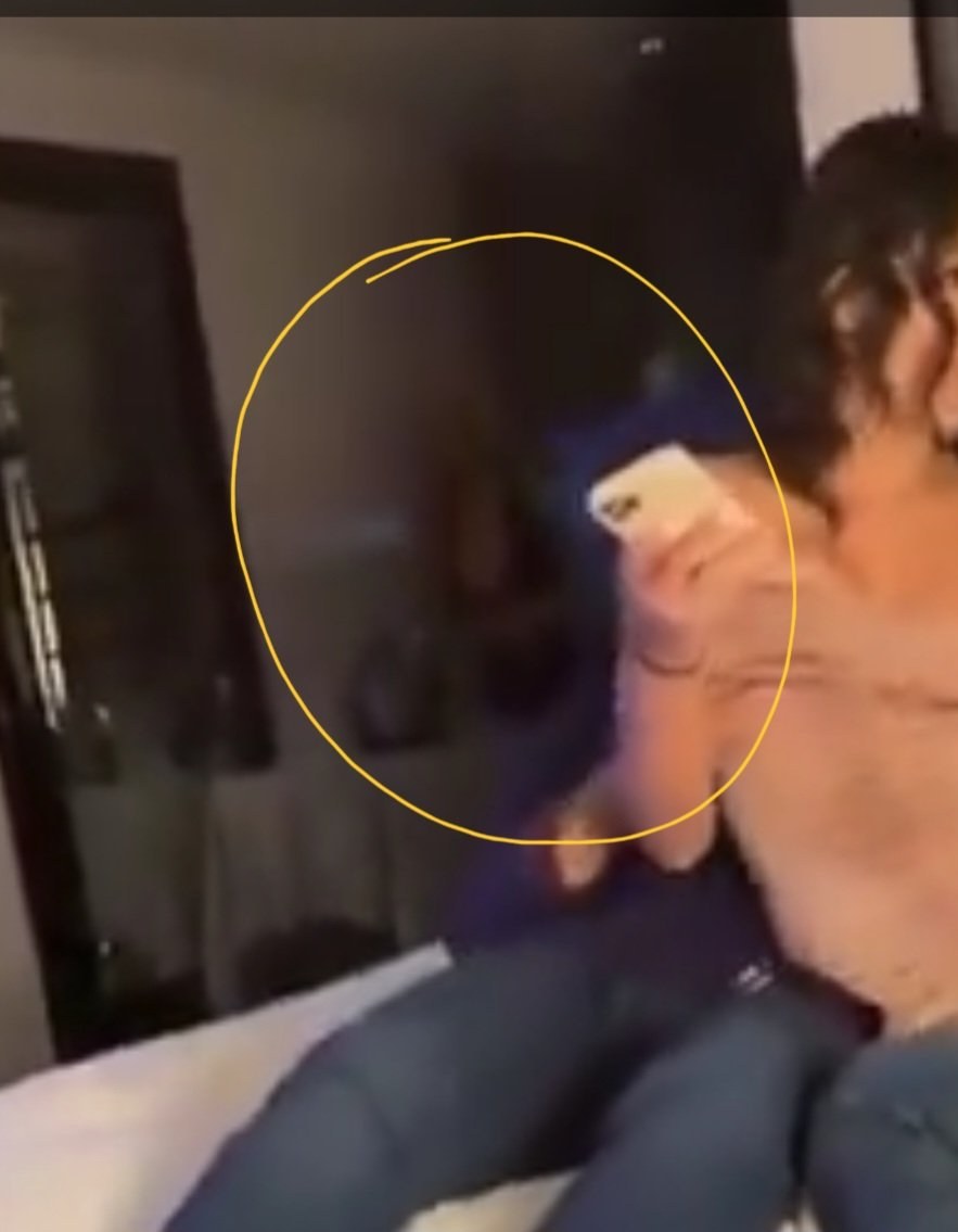 Background crop showing a possible residual shape or hallucinated figure